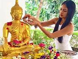 buddha statue and woman