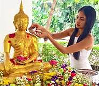 buddha statue and woman