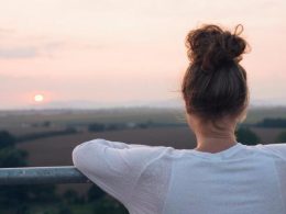 woman viewing sunset